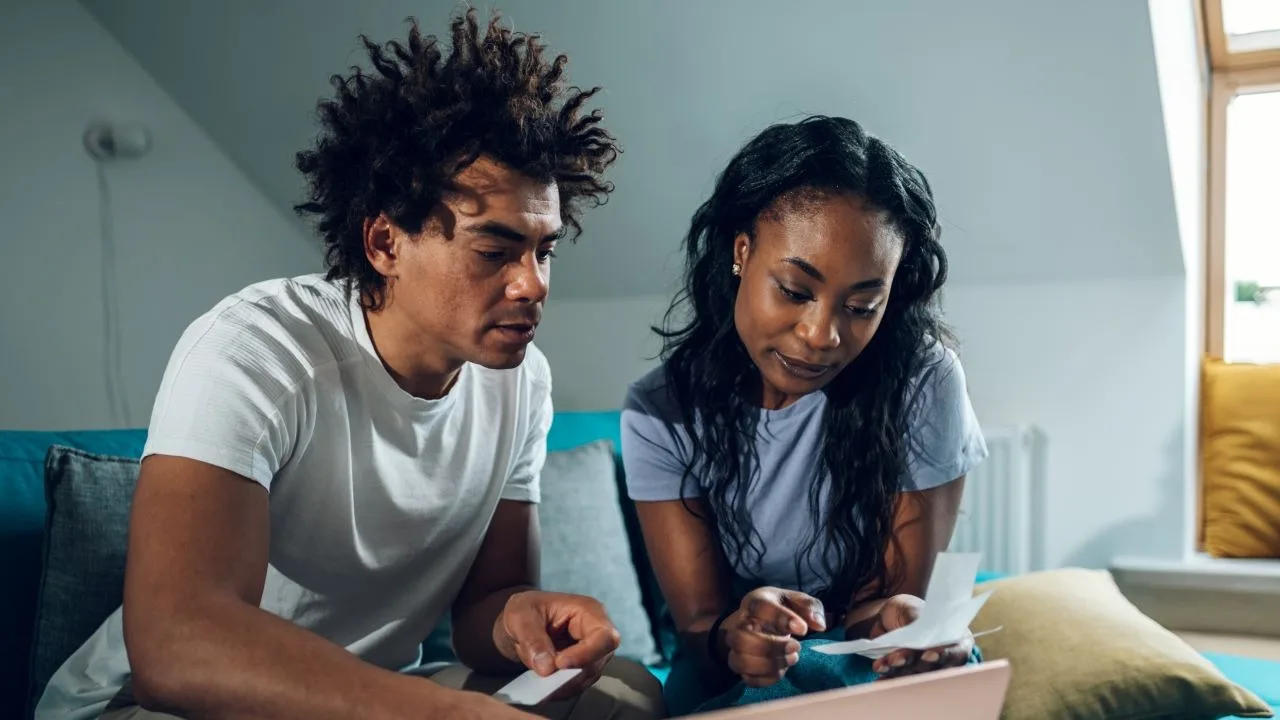Young couple trying to figure out how to consolidate student loans