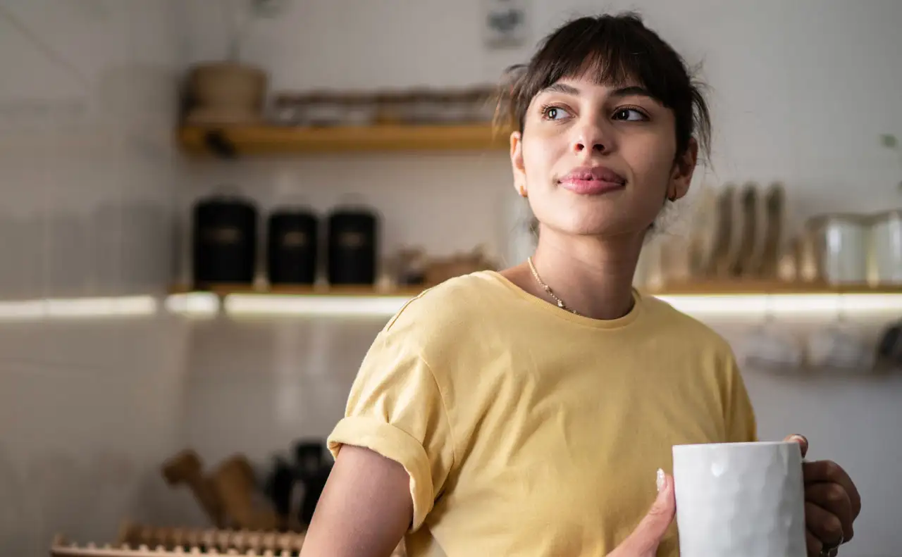 Young woman drinking coffee