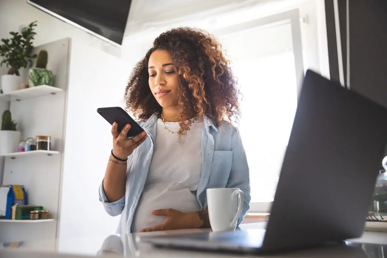 Pregnant woman working from home