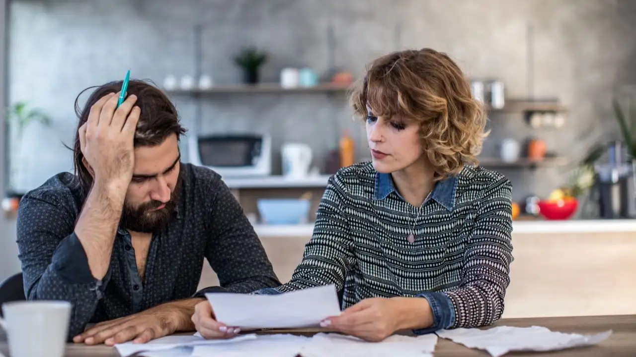 Married couple having financial problems at home.