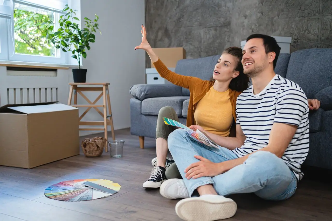 Young couple dreaming about home renovations