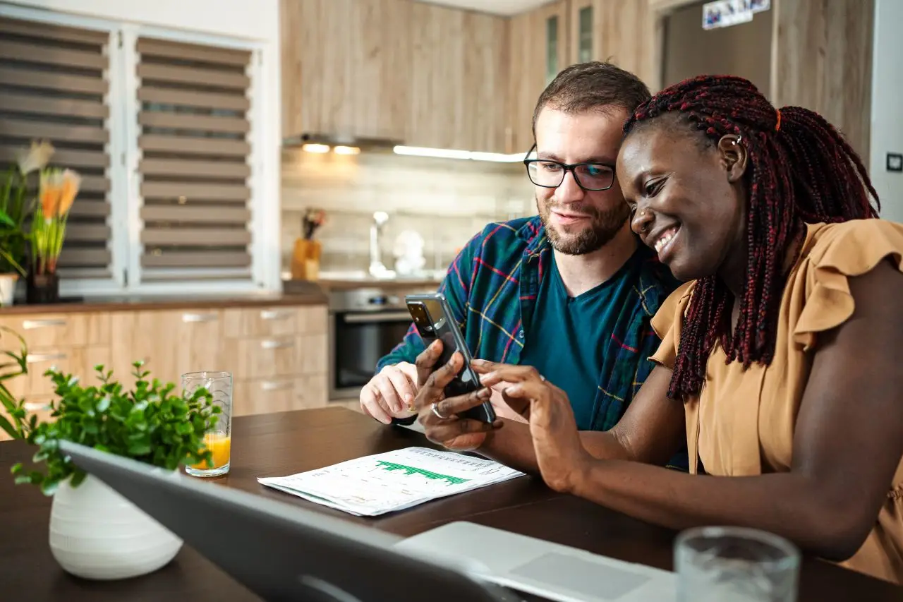 Couple checking finances and bank accounts