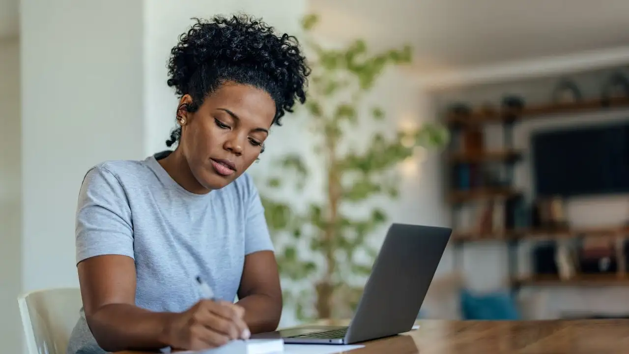 Young woman reviewing her finances